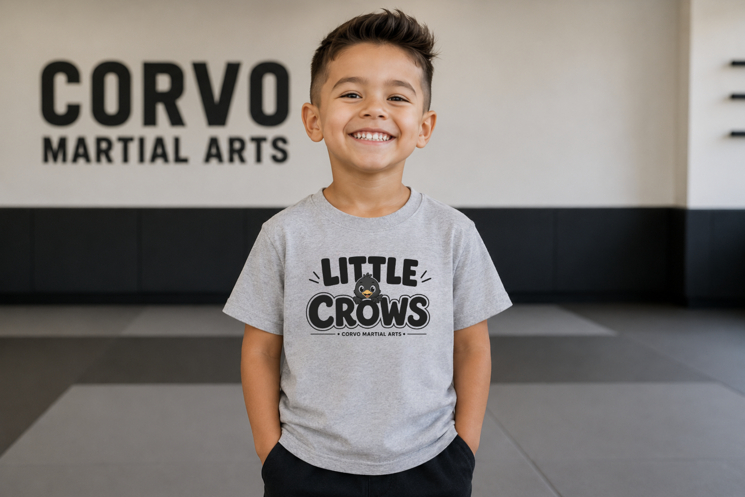 Little Crows kids tee for Corvo Martial Arts, in the gym.